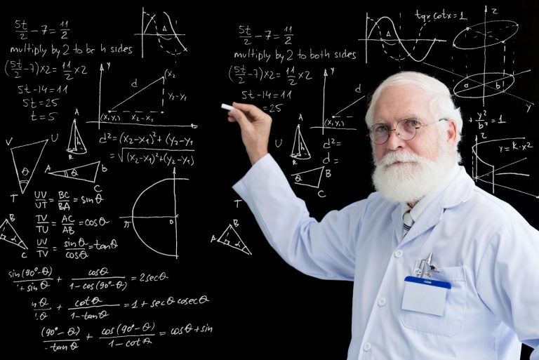 Senior professor of math whiting formulas on blackboard